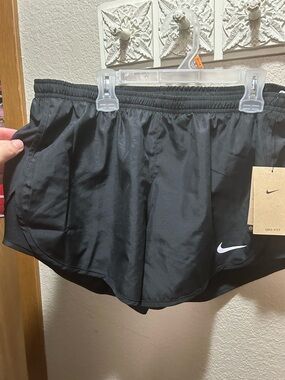 Nike Women’s Black Athletic Shorts with White Swoosh